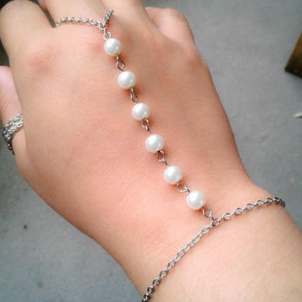 Beautiful faux pearl slave bracelet